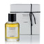 A bottle of Alambar 100ml Eau de Parfum next to its white packaging box.