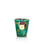 Decorative candle in a green container with floral design on a white background