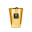 A collection of gold colored candles with glass containers, each with a label reading 'Baobab'.